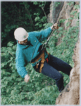 abseiling down a cliff
